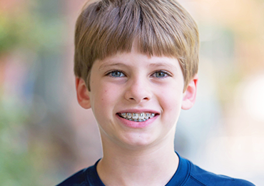 Young boy with braces
