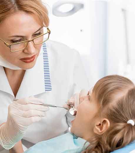 Little girl undergoing oral examination