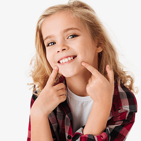 Girl with lingual baces pointing to her smile