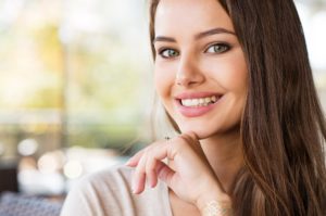 Woman with attractive smile from cosmetic dentist