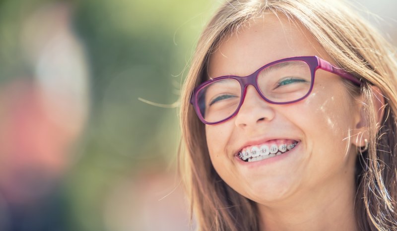 kid smiling with braces