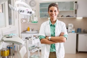 an orthodontist smiling and ready to answer questions