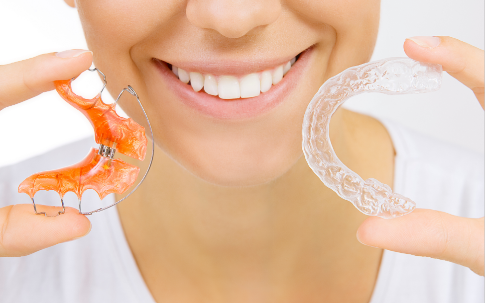 Woman holding retainers